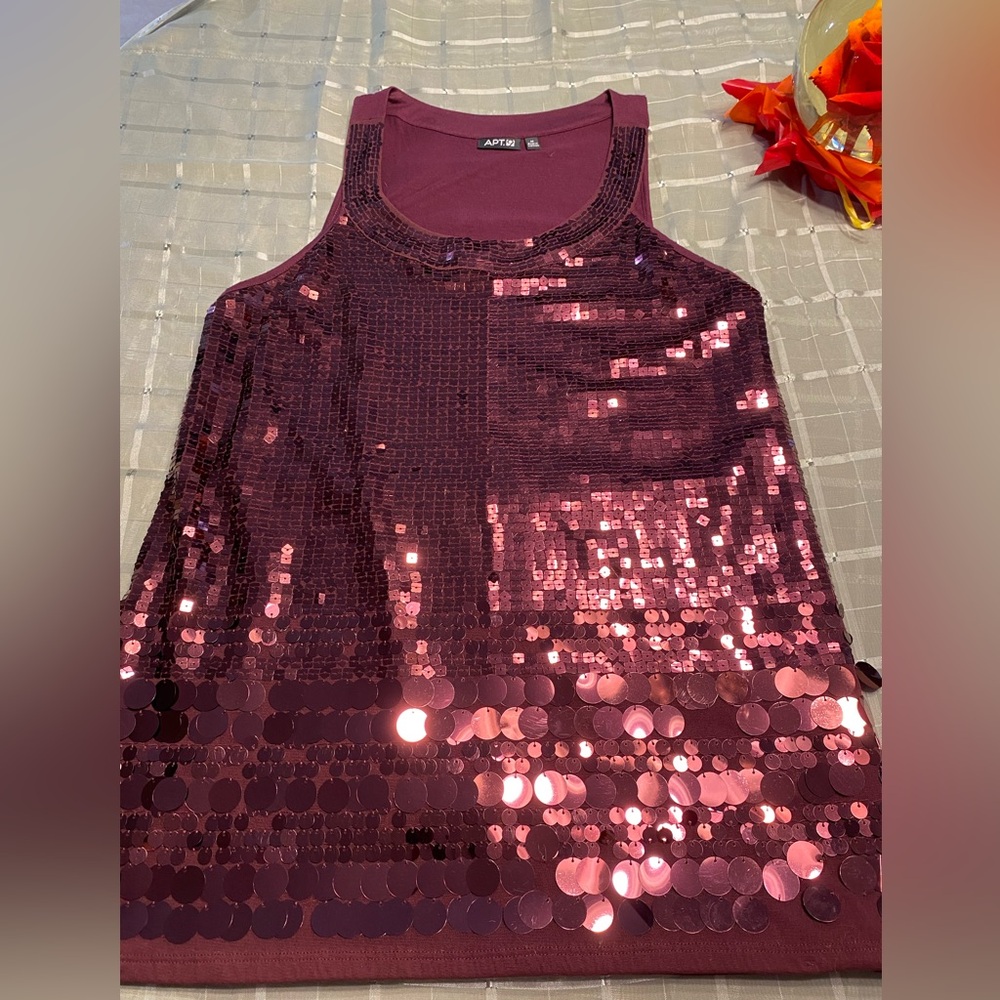 Beautiful dark burgundy top that shimmers.